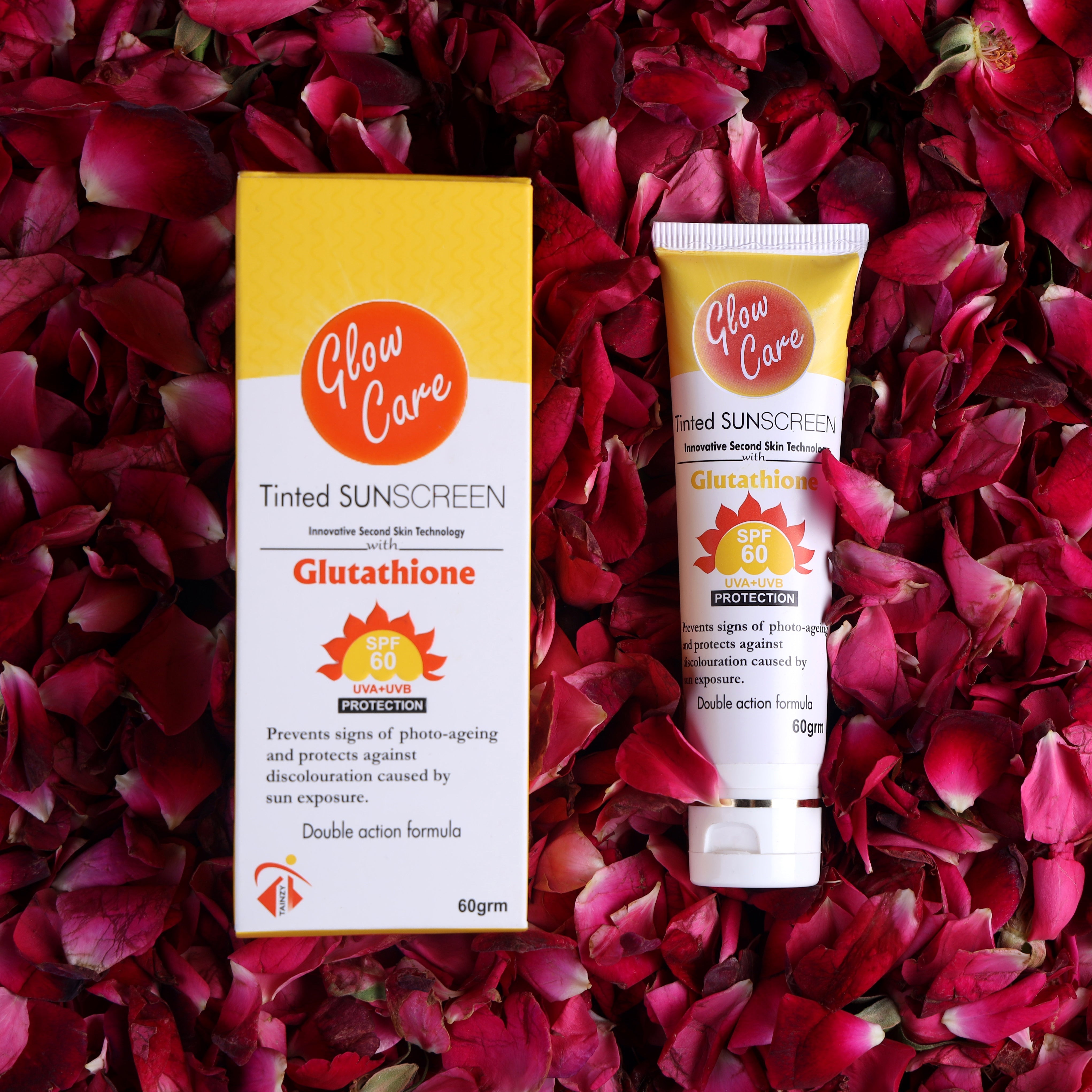SPF 60 tinted sunscreen with glutathione on rose petals, skin protection product