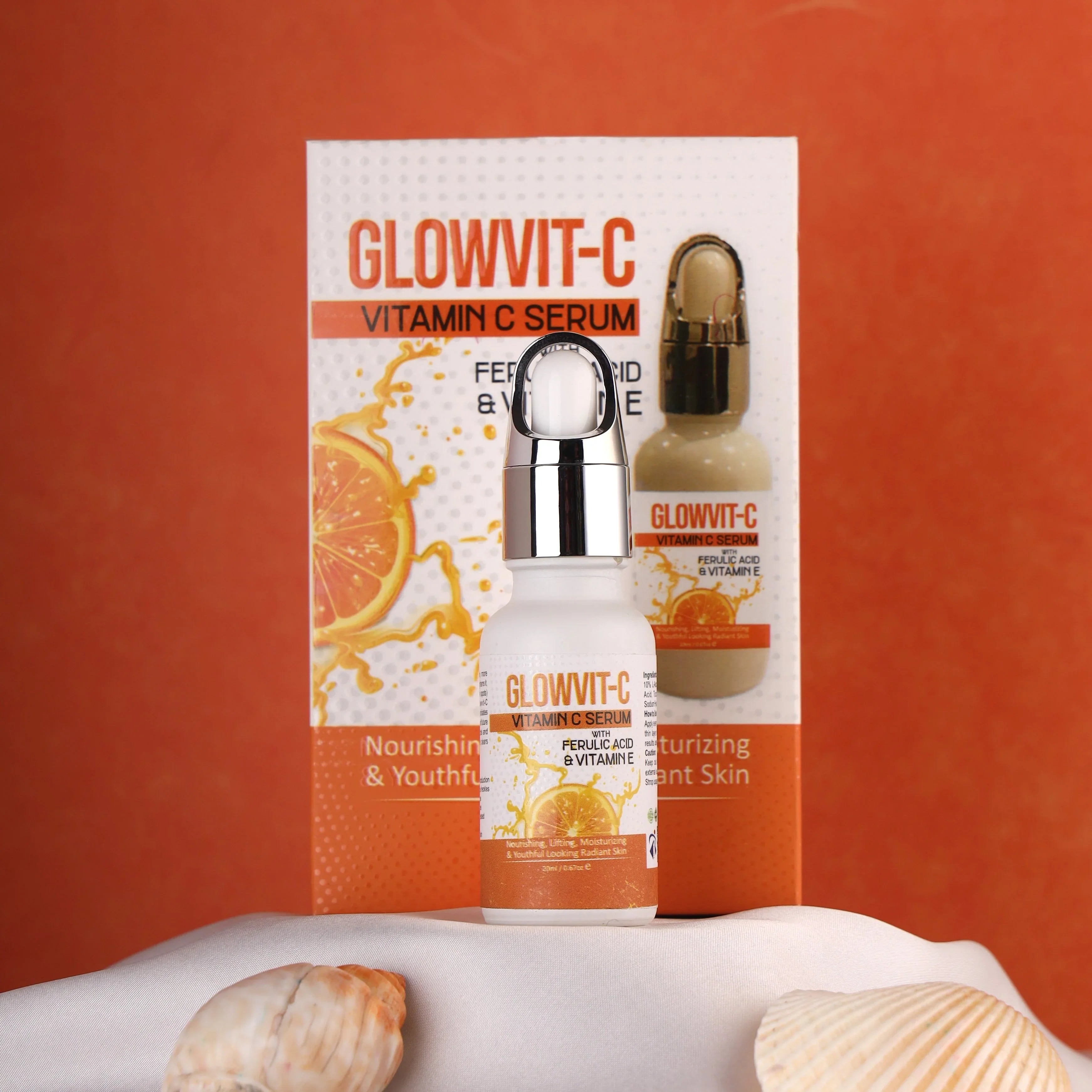 Glowvit-C vitamin C serum bottle and packaging with orange slice, for radiant skin care