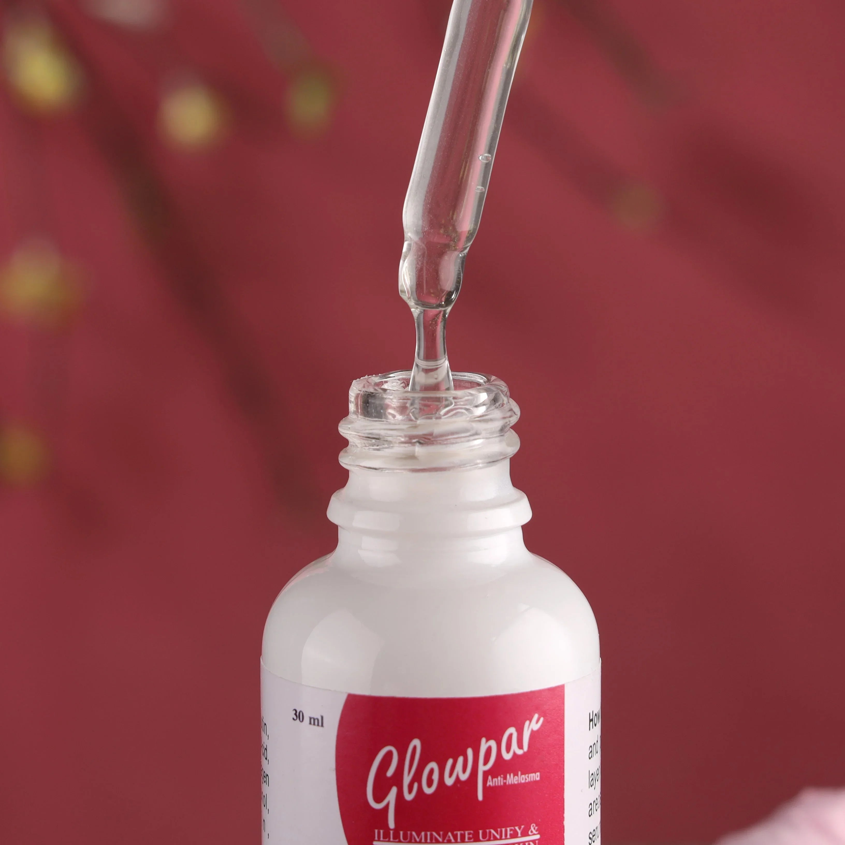 Glowpar anti-melasma serum bottle with dropper for skin brightening and pigmentation